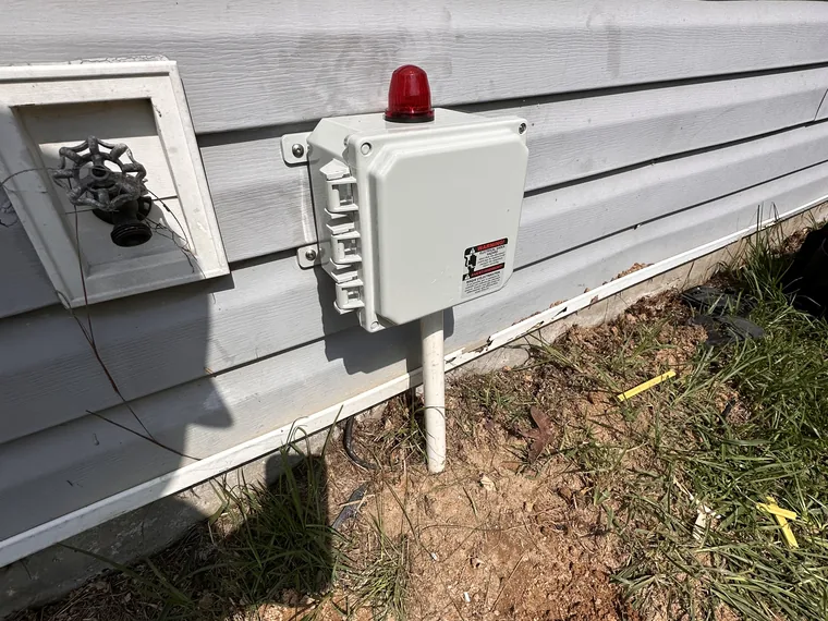 Weather-tight septic alarm panel install by SepticRooter™ in Savannah & the SC Low Country, GA